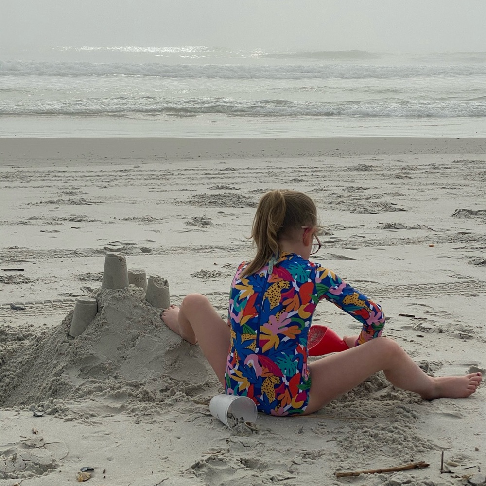 ISO Jungle Roar Mott50 one piece rash guard sz 12 or 14 girls